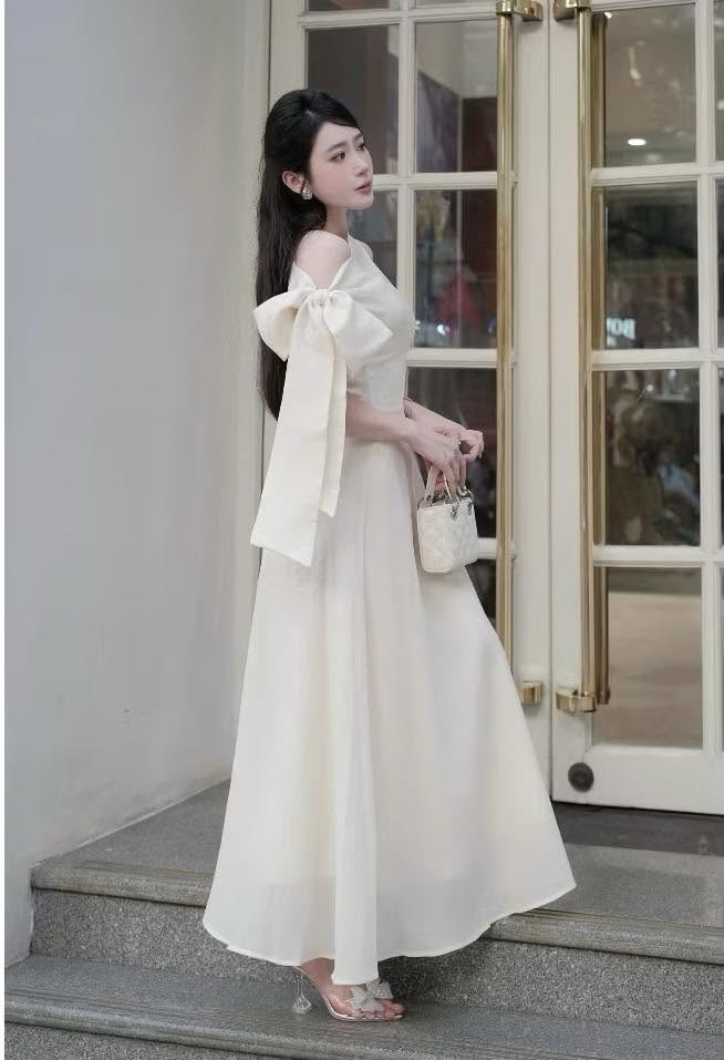 https://www.vayhoasim.vn/Đầm tơ xòe dài cột nơ chéo vai Size S -Mã  KESK038